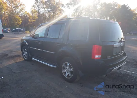 2011 Honda Pilot Touring из США, поврежденный, VIN 5FNYF4H98BB022117